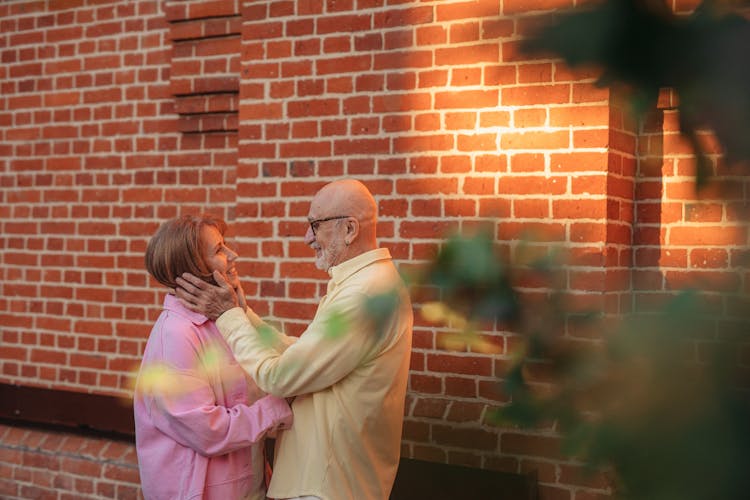 Happy Elderly Couple Looking At Each Other