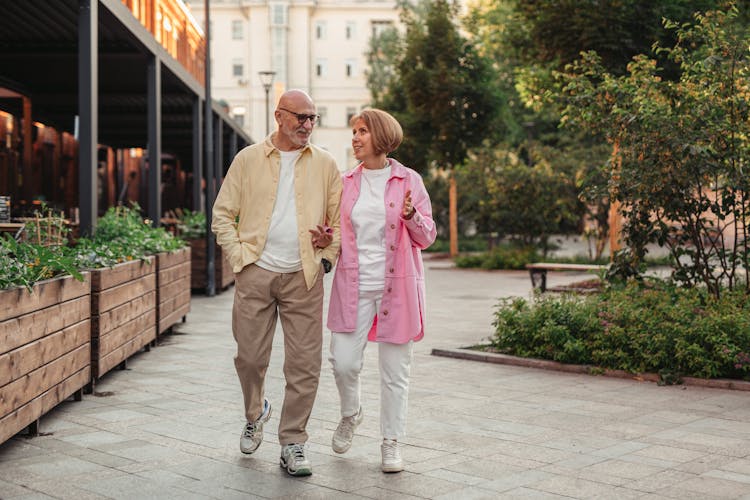 Elderly Couple Walking Together