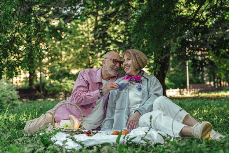 An Elderly Couple Having A Picnic