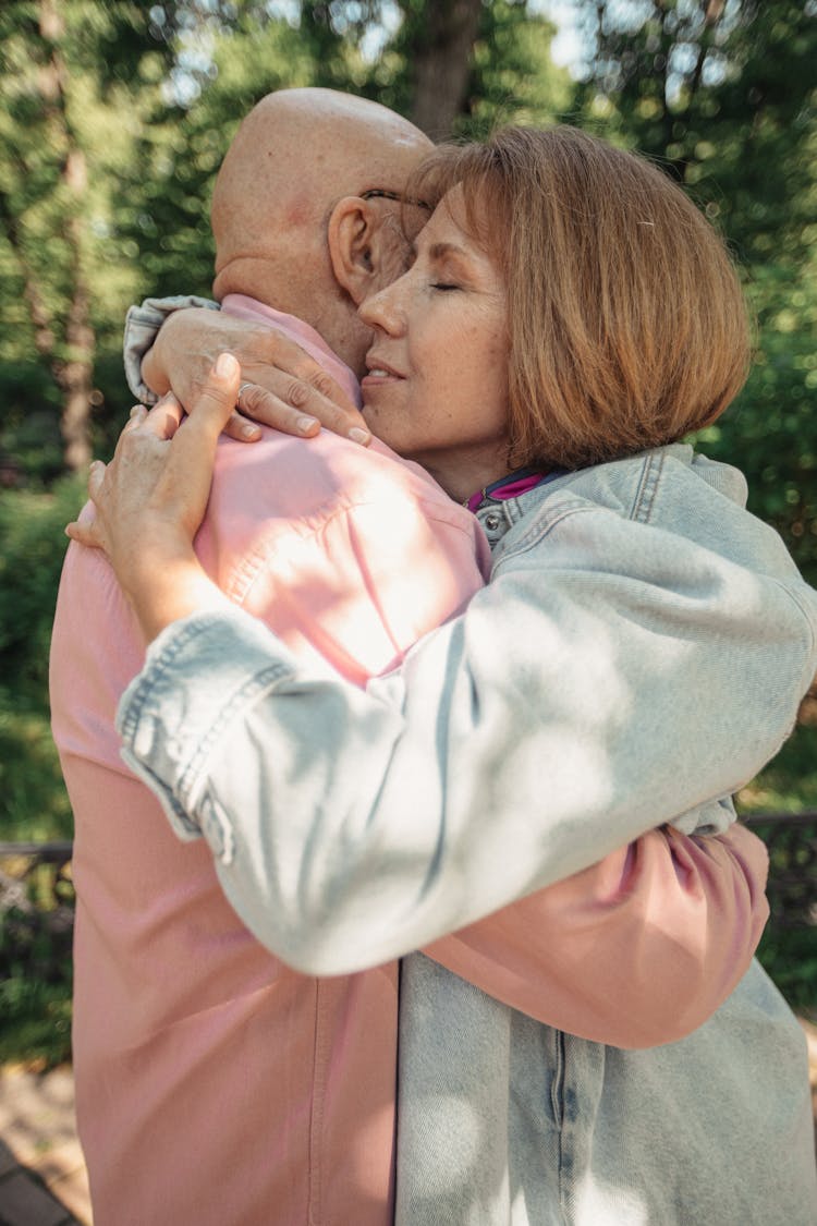 Elderly Couple Hugging Each Other