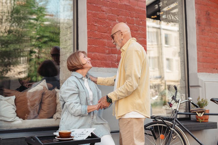 Elderly Couple Talking At Each Other