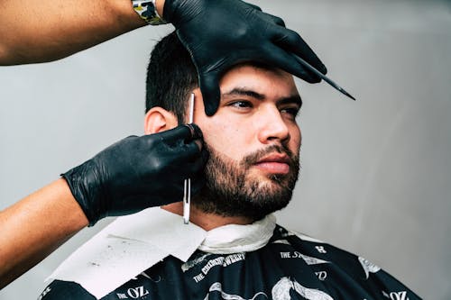 Free Man Taking Beard Shave Stock Photo