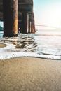 Closeup Photo of Seashore Near Bridge