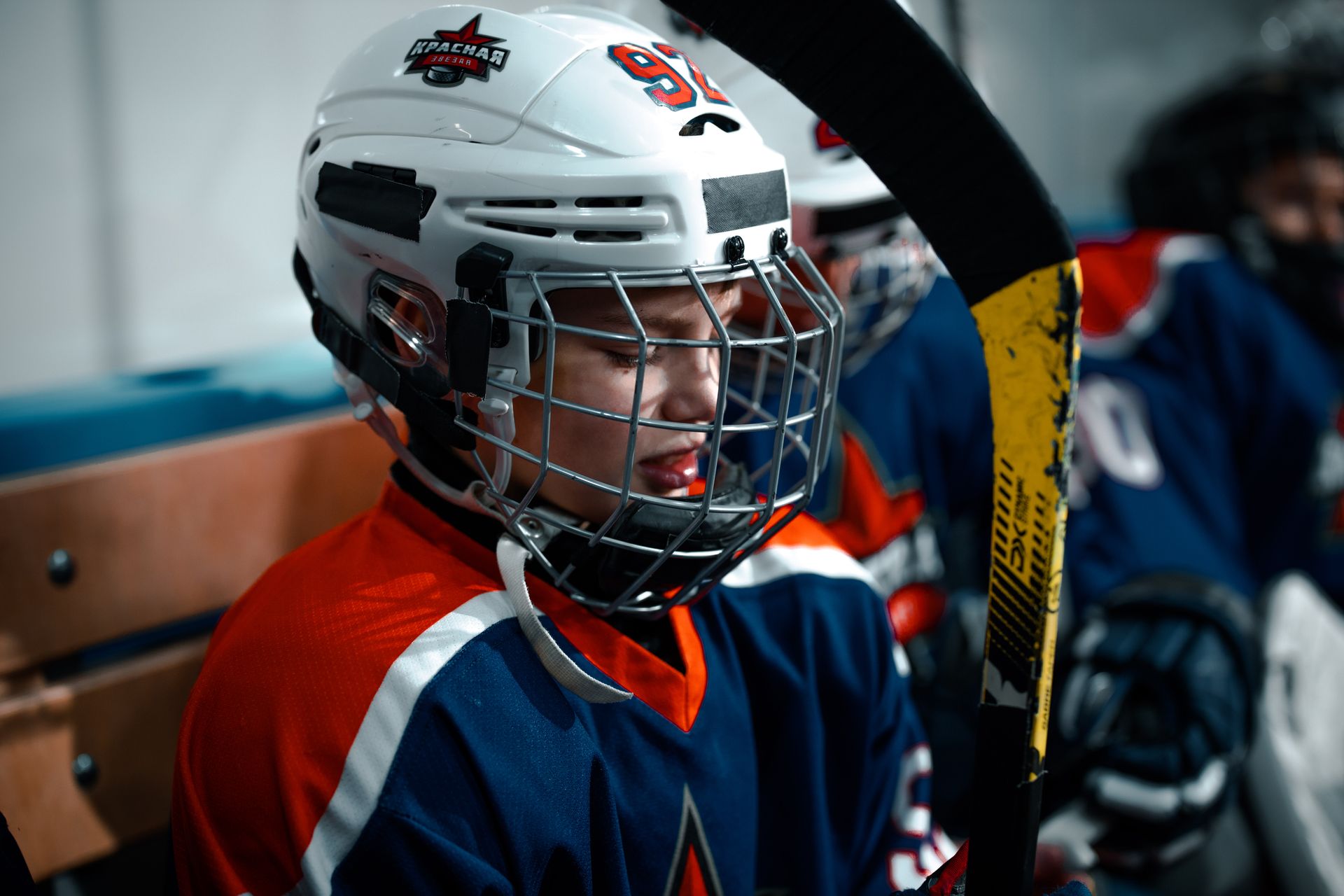 A Hockey Player With a Hockey Stick
