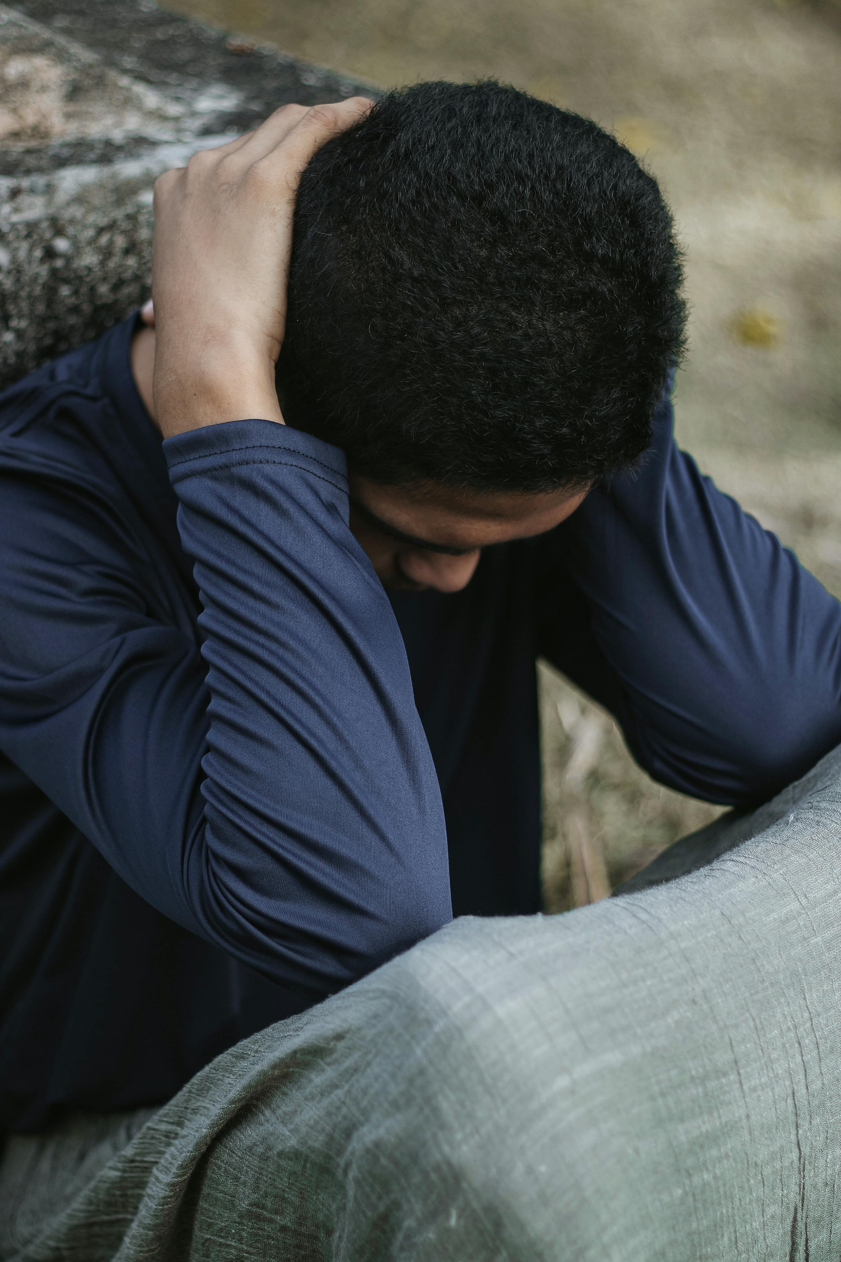 Man with Head Down · Free Stock Photo