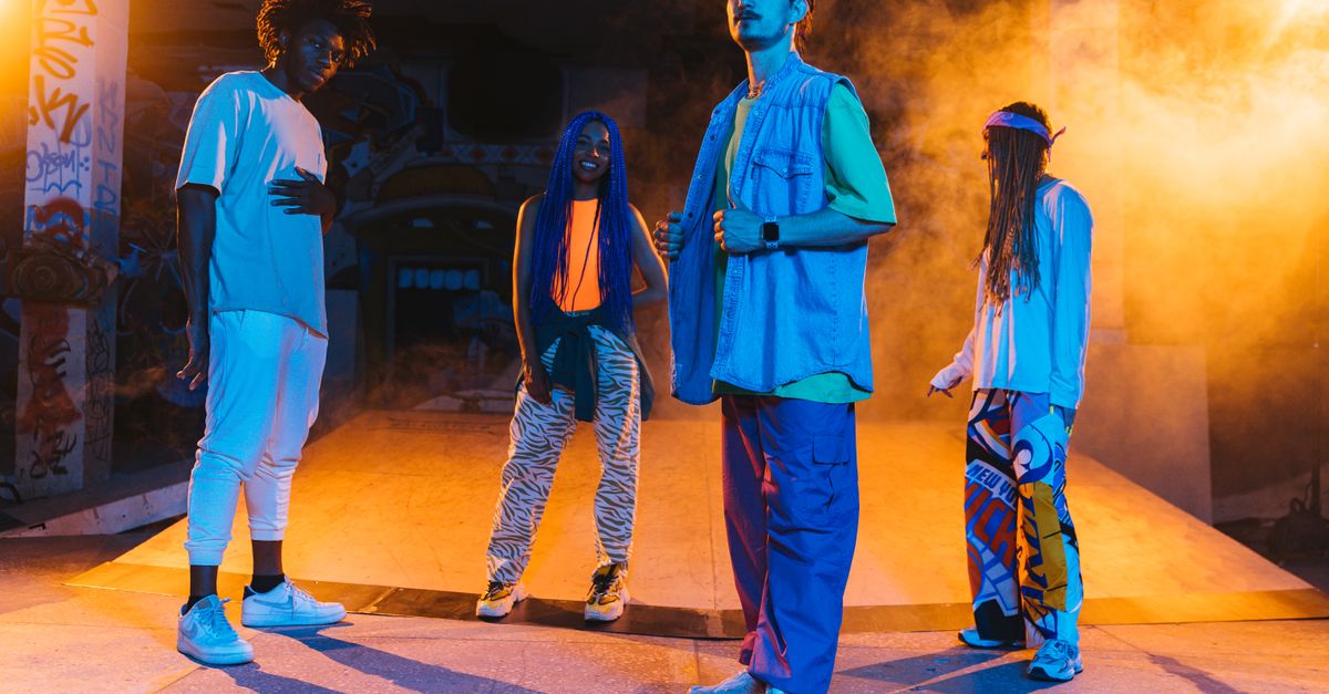 vibrant 1970s street party with dancers and graffiti, colorful lighting