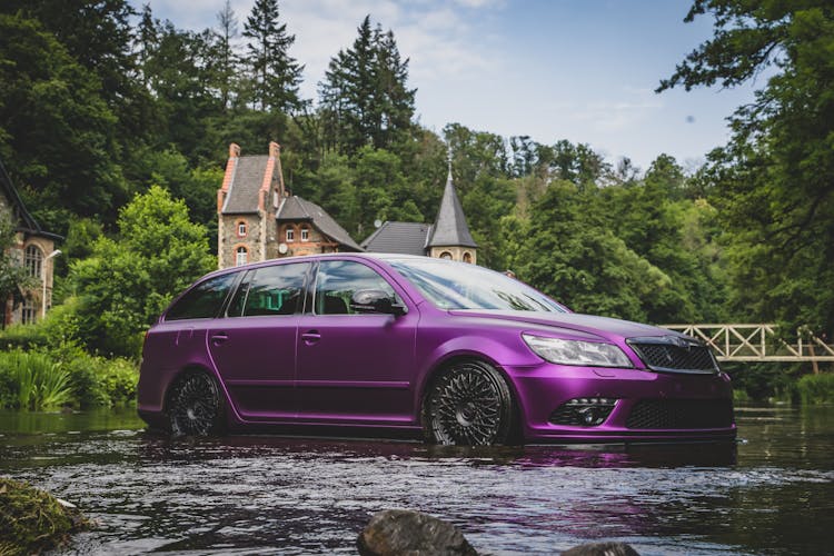 Purple Skoda Fabia In Water 