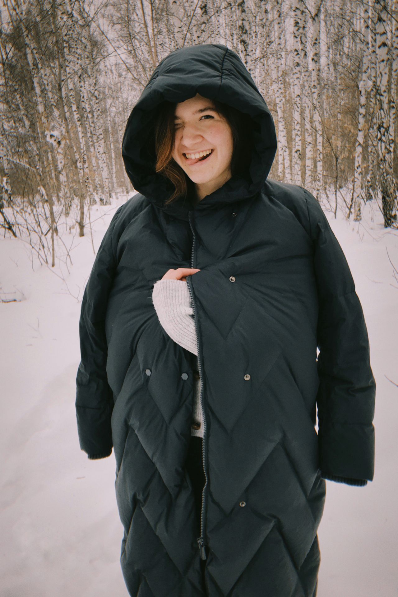 Puffer coat over an elegant midi dress modest winter look