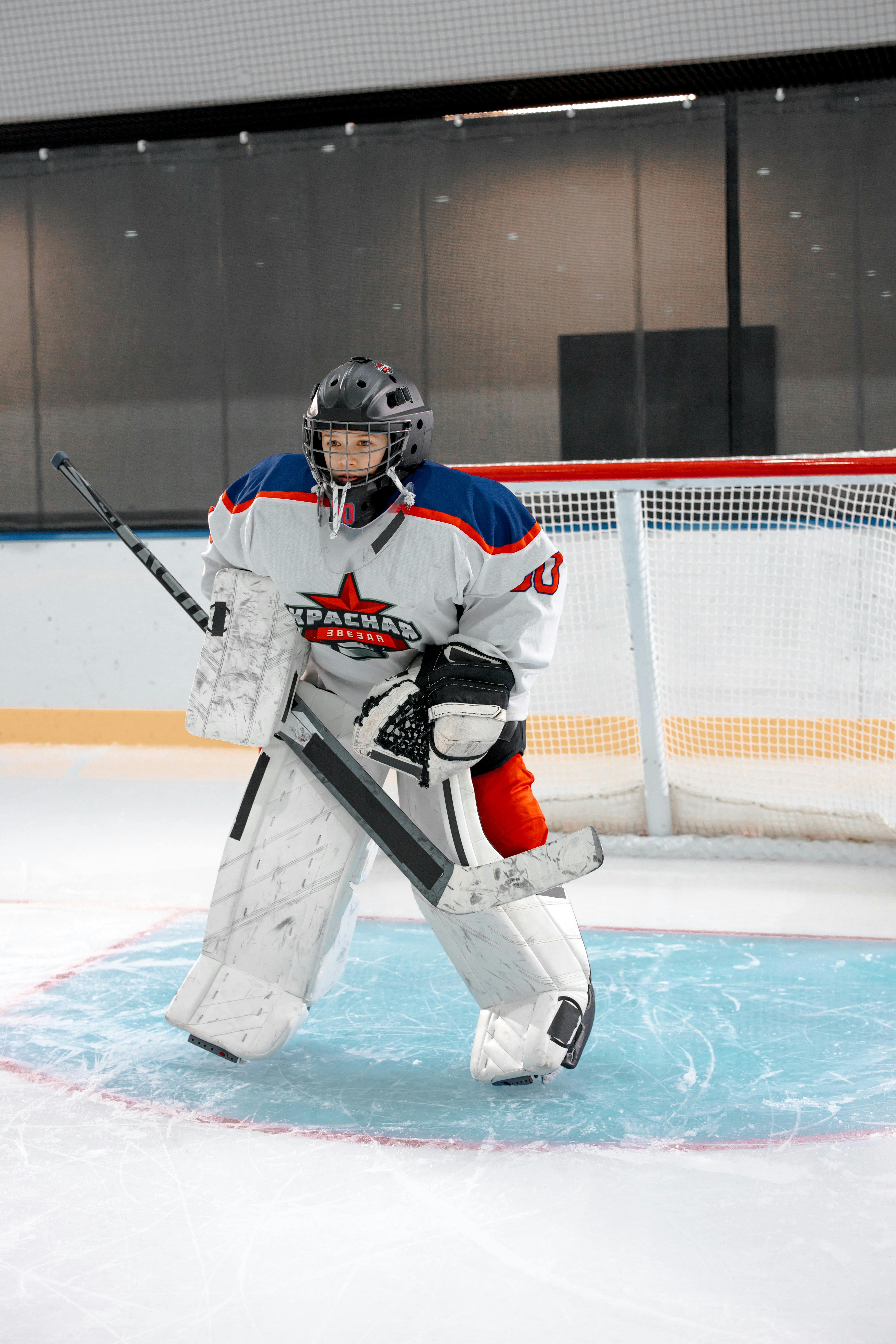 hockey player protecting the goal