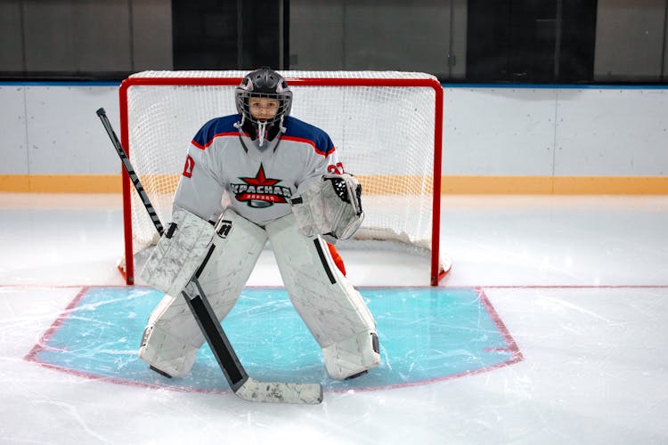 Hockey Player On An Ice Rink 