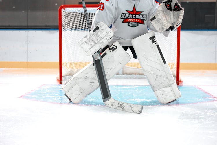 Hockey Player On An Ice Rink 