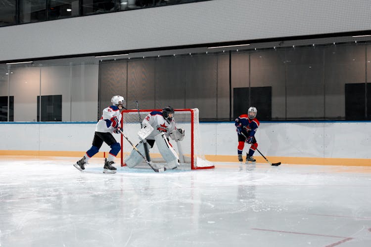 Men Playing Ice Hockey