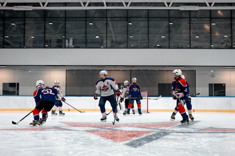 People Playing Ice Hockey 