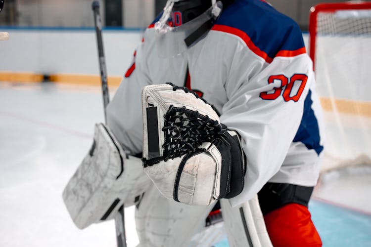 Person In White And Red Ice Hockey Jersey Top