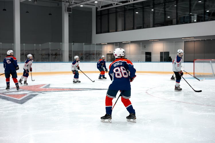 People Playing Hockey