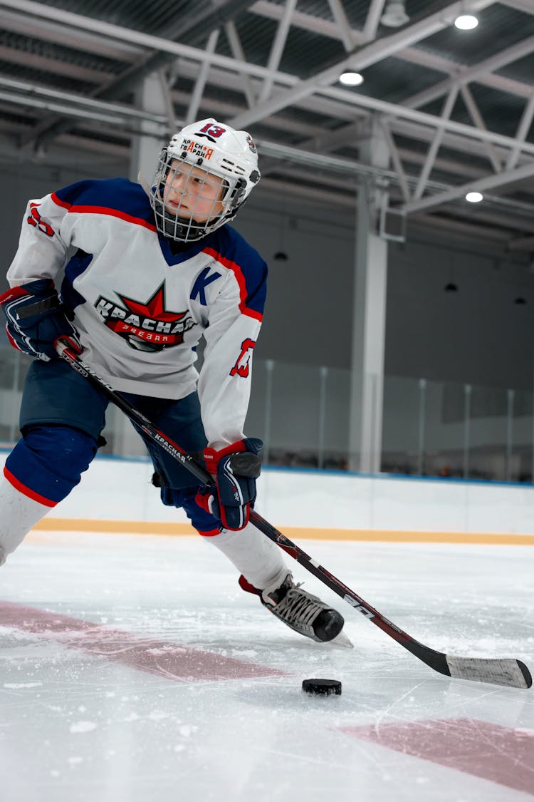 Person Playing Ice Hockey 