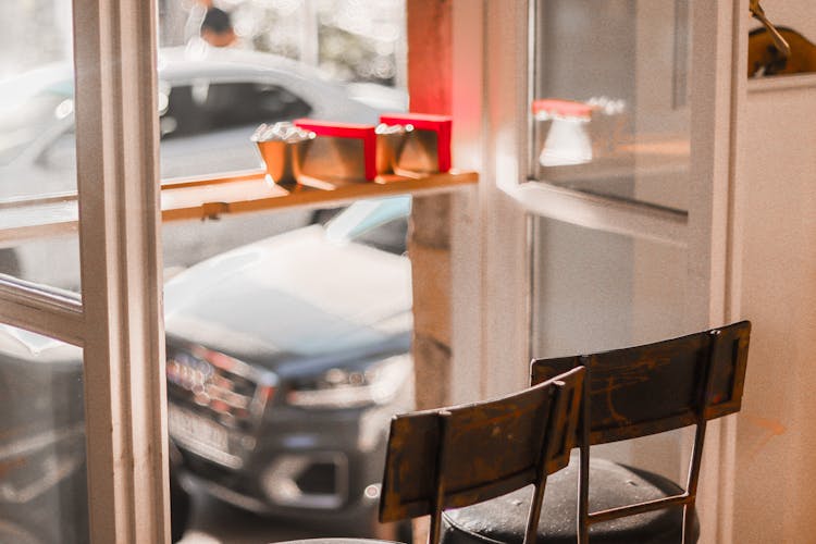 Chairs By The Window In A Restaurant 