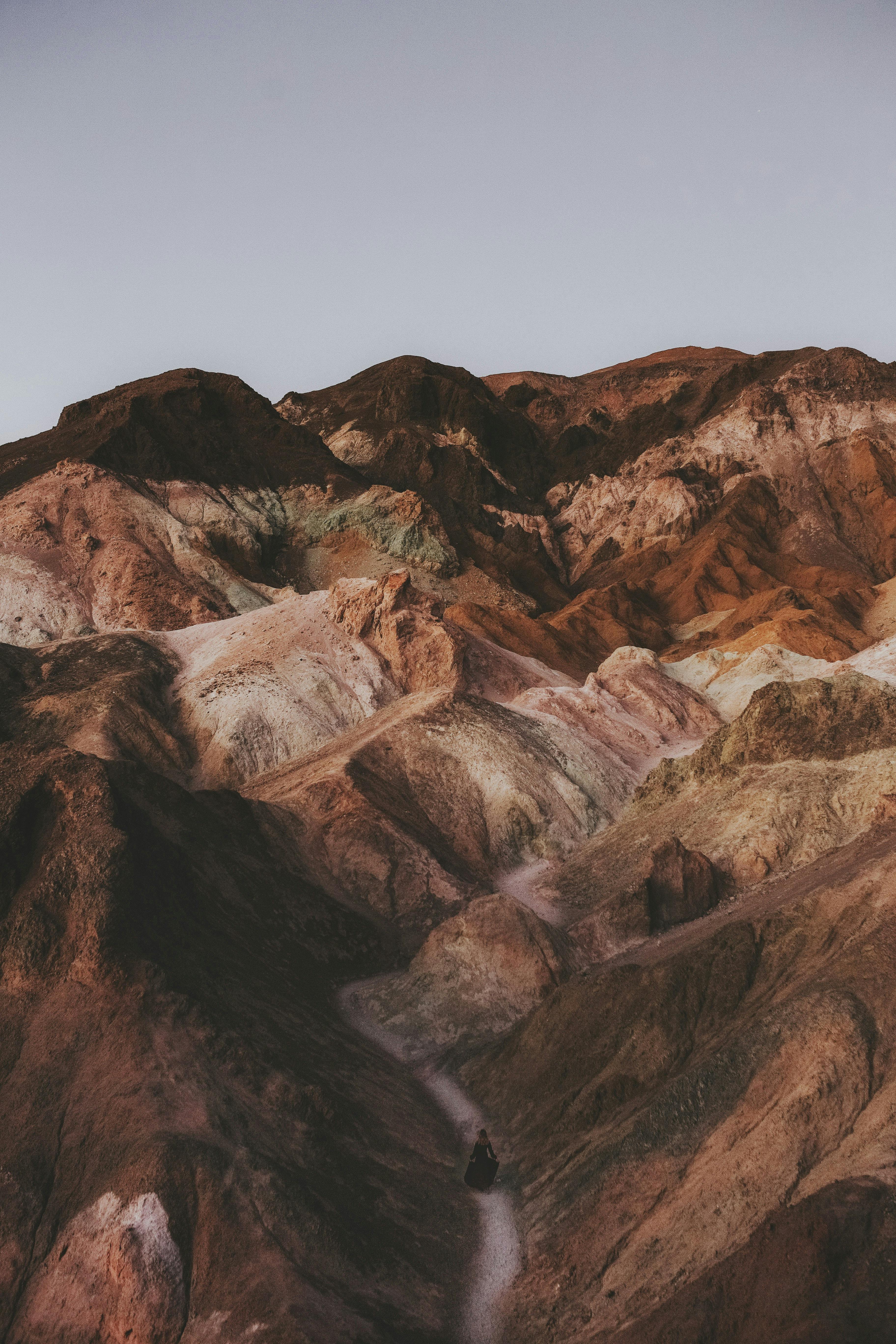 Stunning view of the colorful rocky mountains at dusk, capturing the unique geological formations.