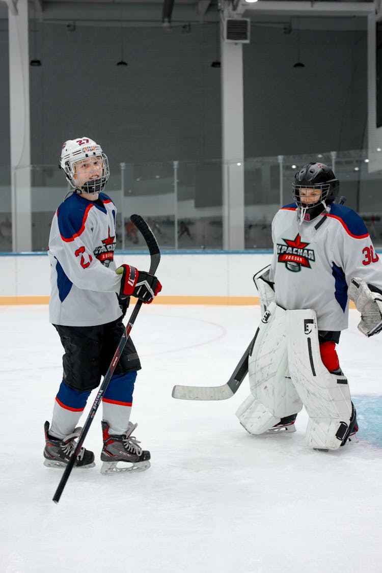 People Playing Ice Hockey