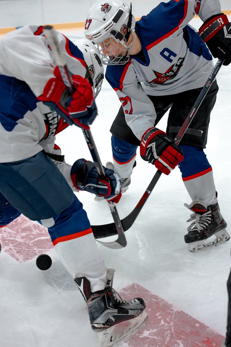 Kids Playing Ice Hockey