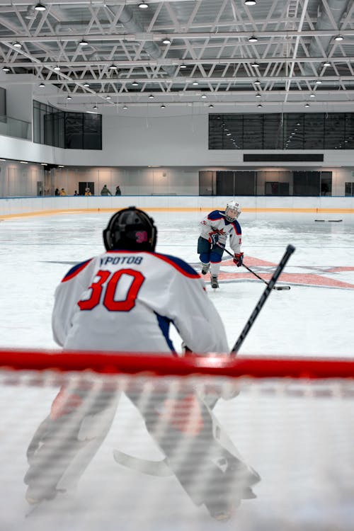 Player Shooting on a Goal Cage