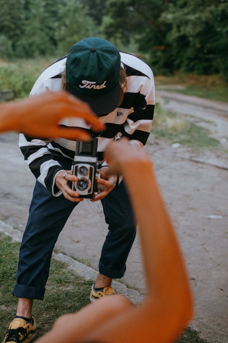 A Photographer Using A Vintage Camera