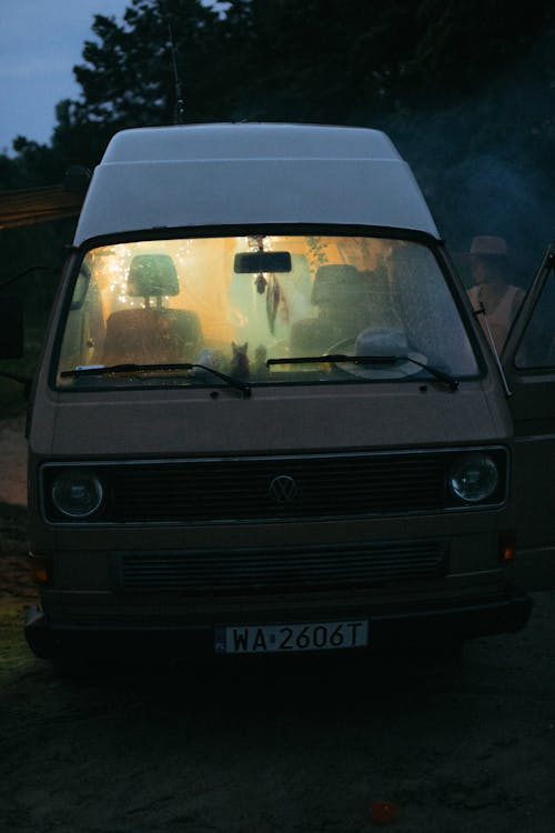Free Camper Van Parked on Camping Site Stock Photo