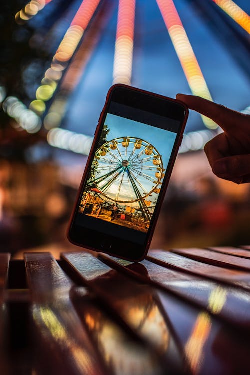 Mobile Phone with Ferris Wheel On Screen