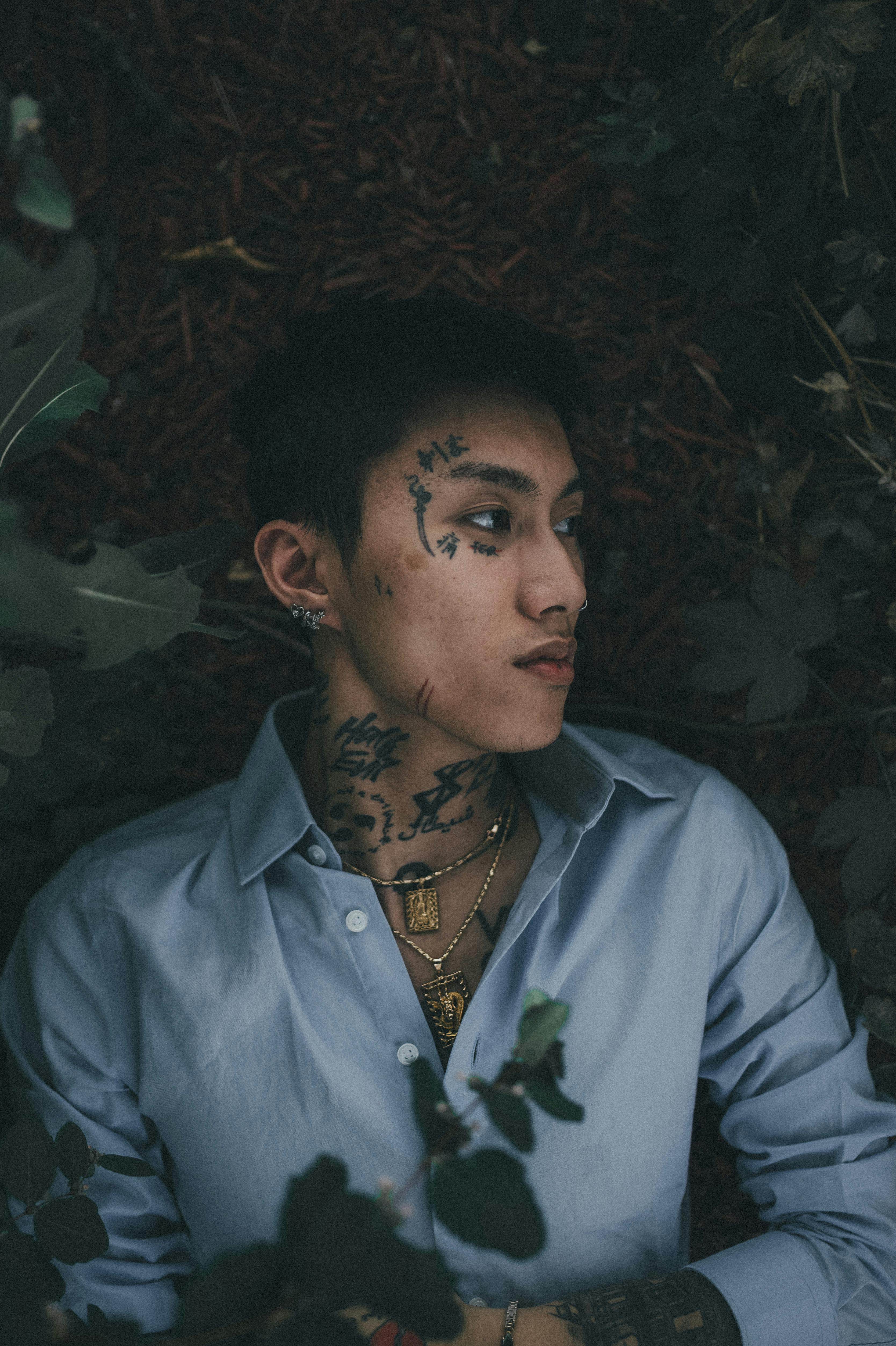 A Man Covered in Tattoos · Free Stock Photo