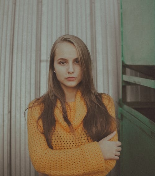 Woman in Yellow Knitwear