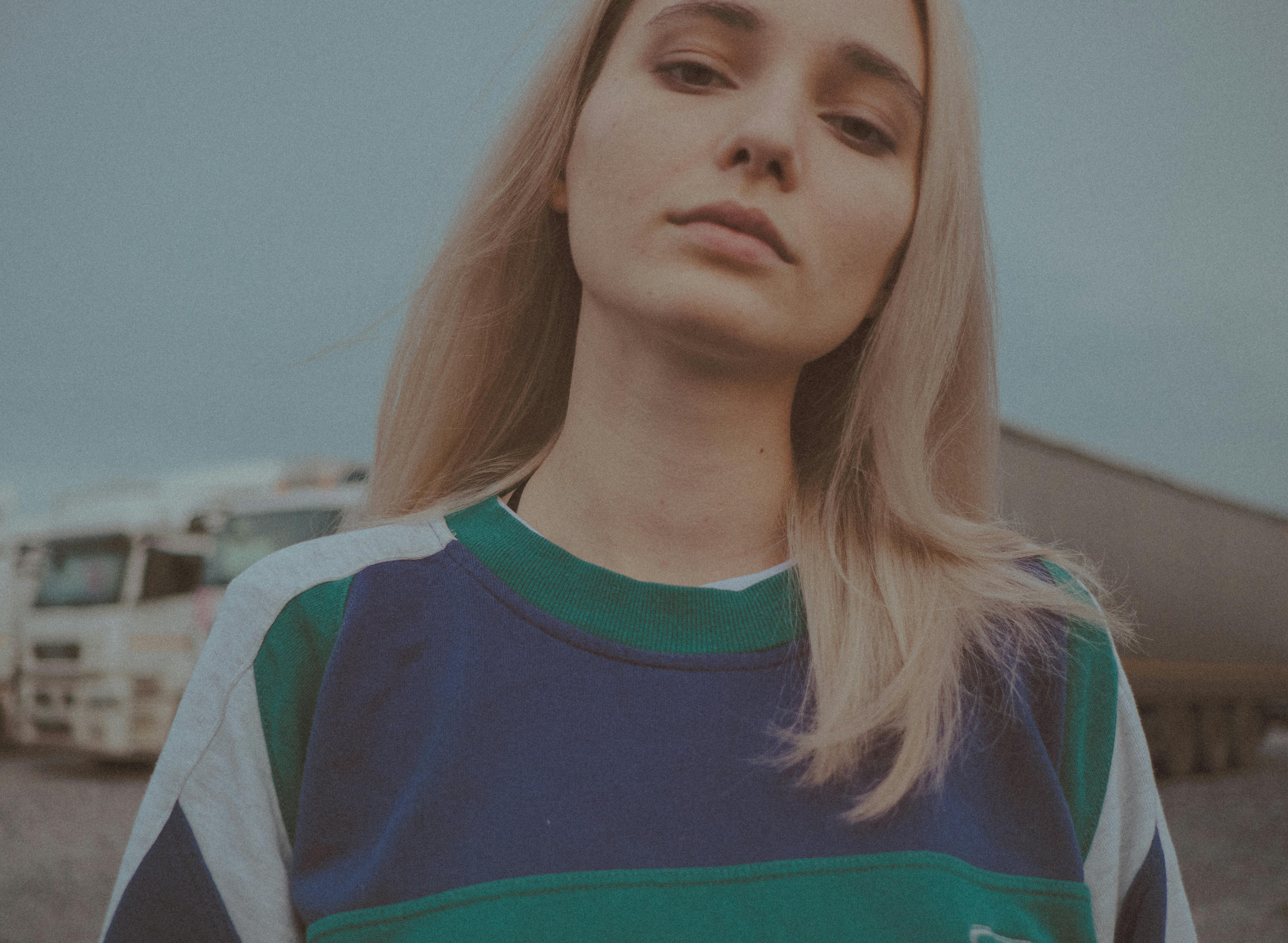 A Blonde in a Black Hoodie · Free Stock Photo