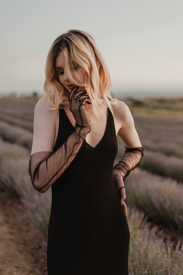 Woman In Black Tank Dress With Long Lace Gloves