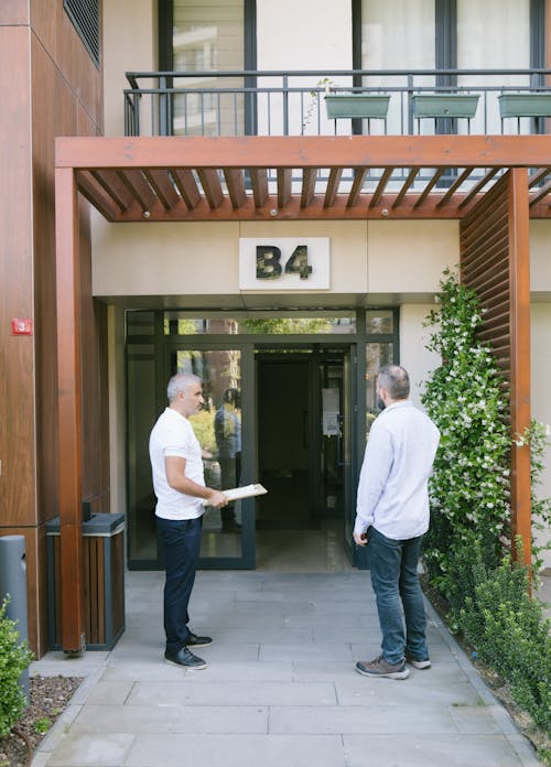 Elderly Men in Front of a Building 