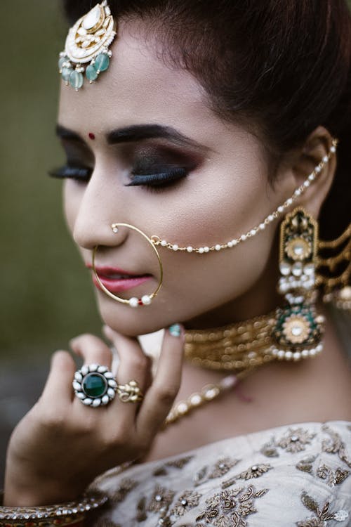 Woman Wearing Different Kinds of Jewelries