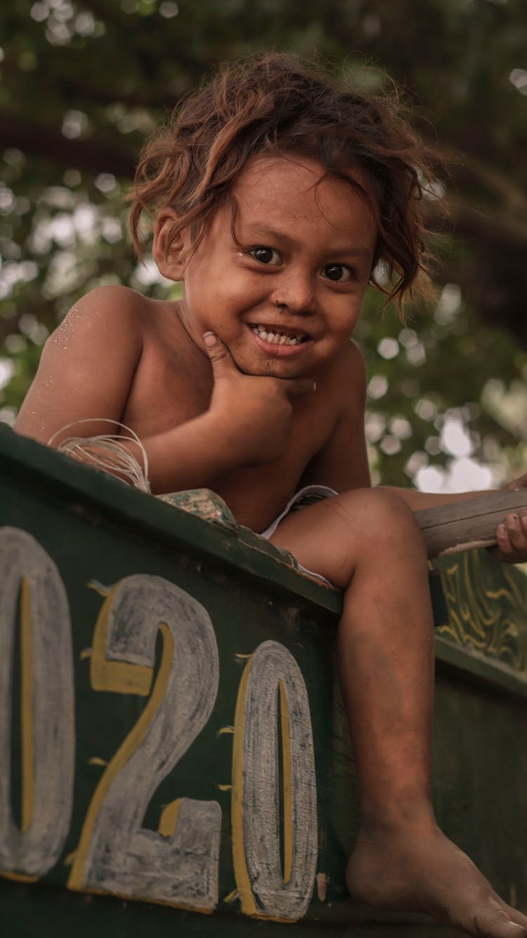 Close-Up Shot Of A Child Smiling