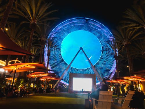 A Colorful Ferris Wheel During Night Time