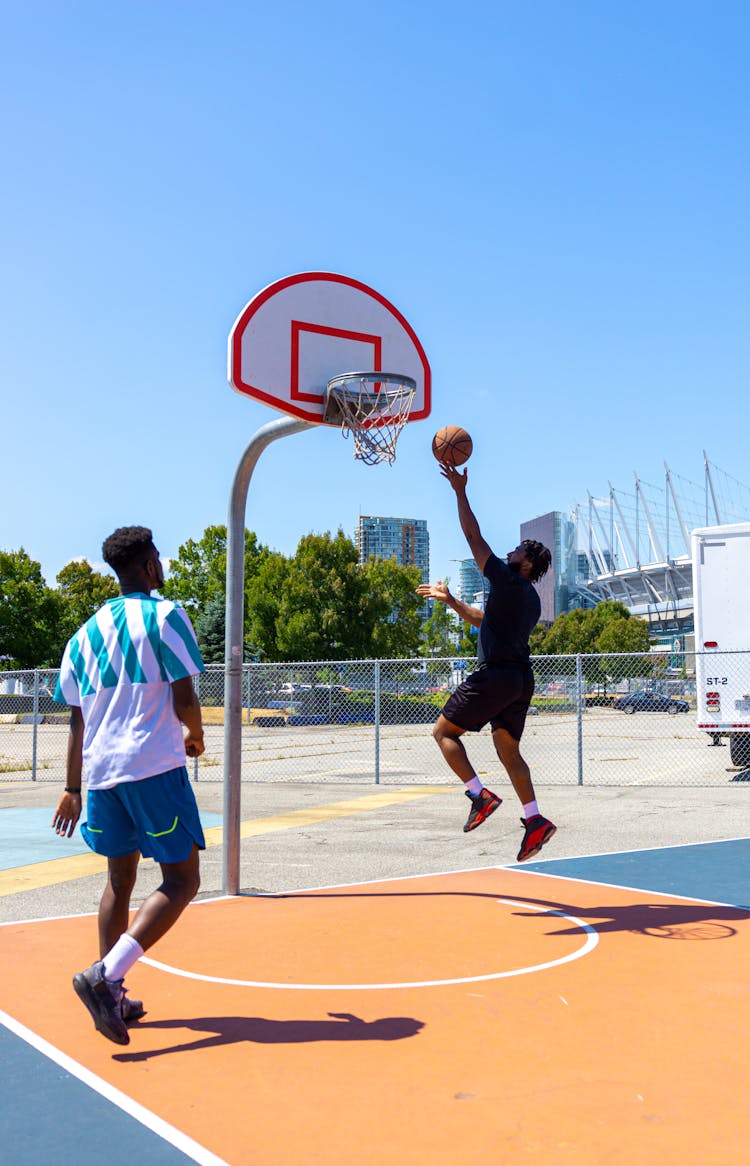  Men Playing Basketball