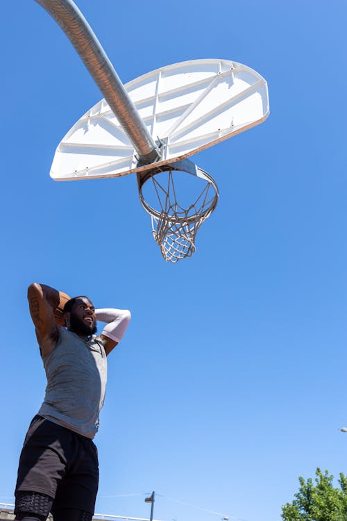 A Man Playing Basketball 