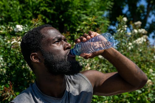 Free Fotos de stock gratuitas de barbudo, bebiendo, botella de agua Stock Photo