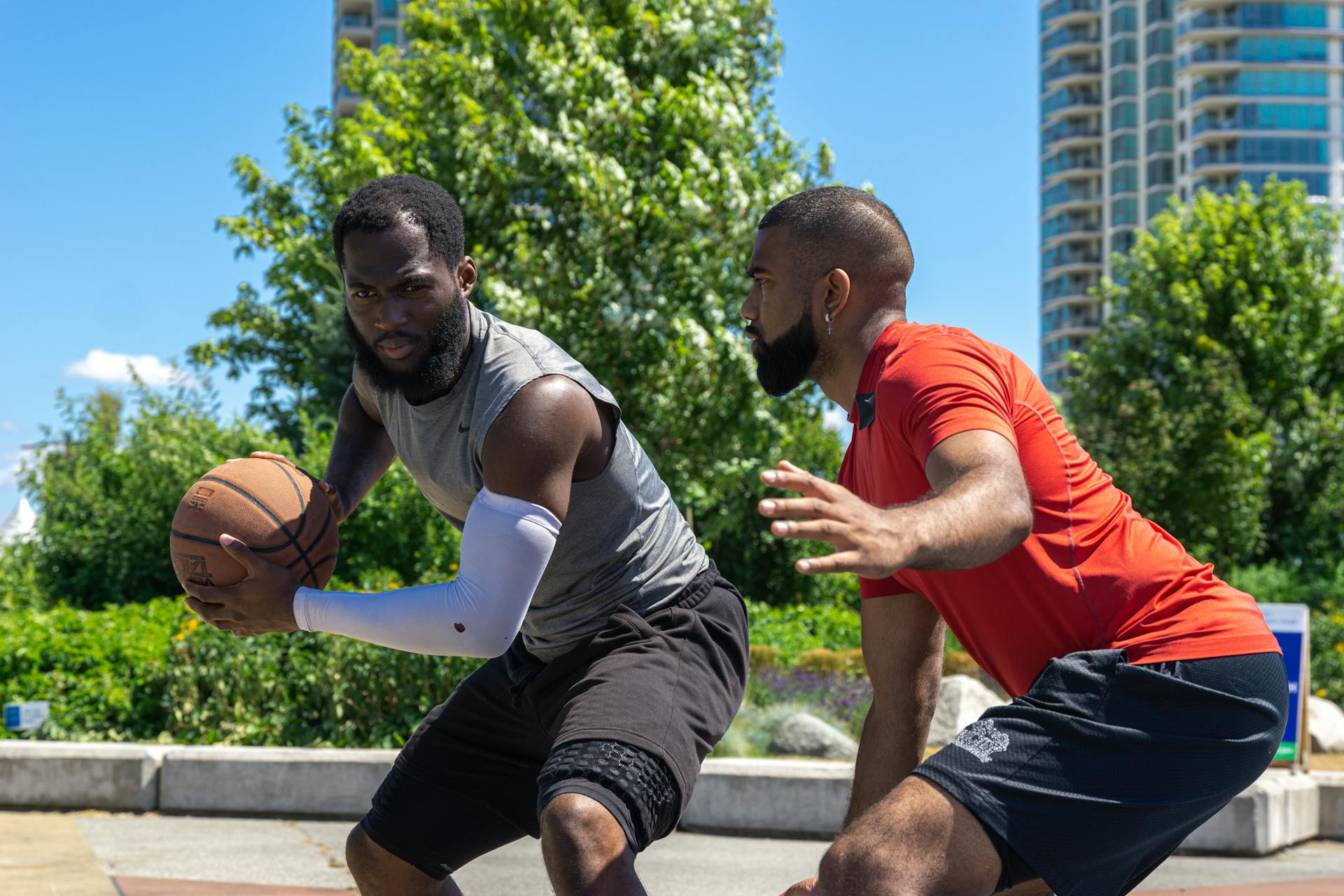 Men Playing Basketball on an Open Court