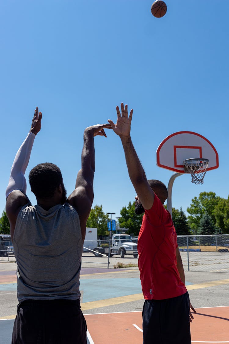 A Man Shooting A Ball 