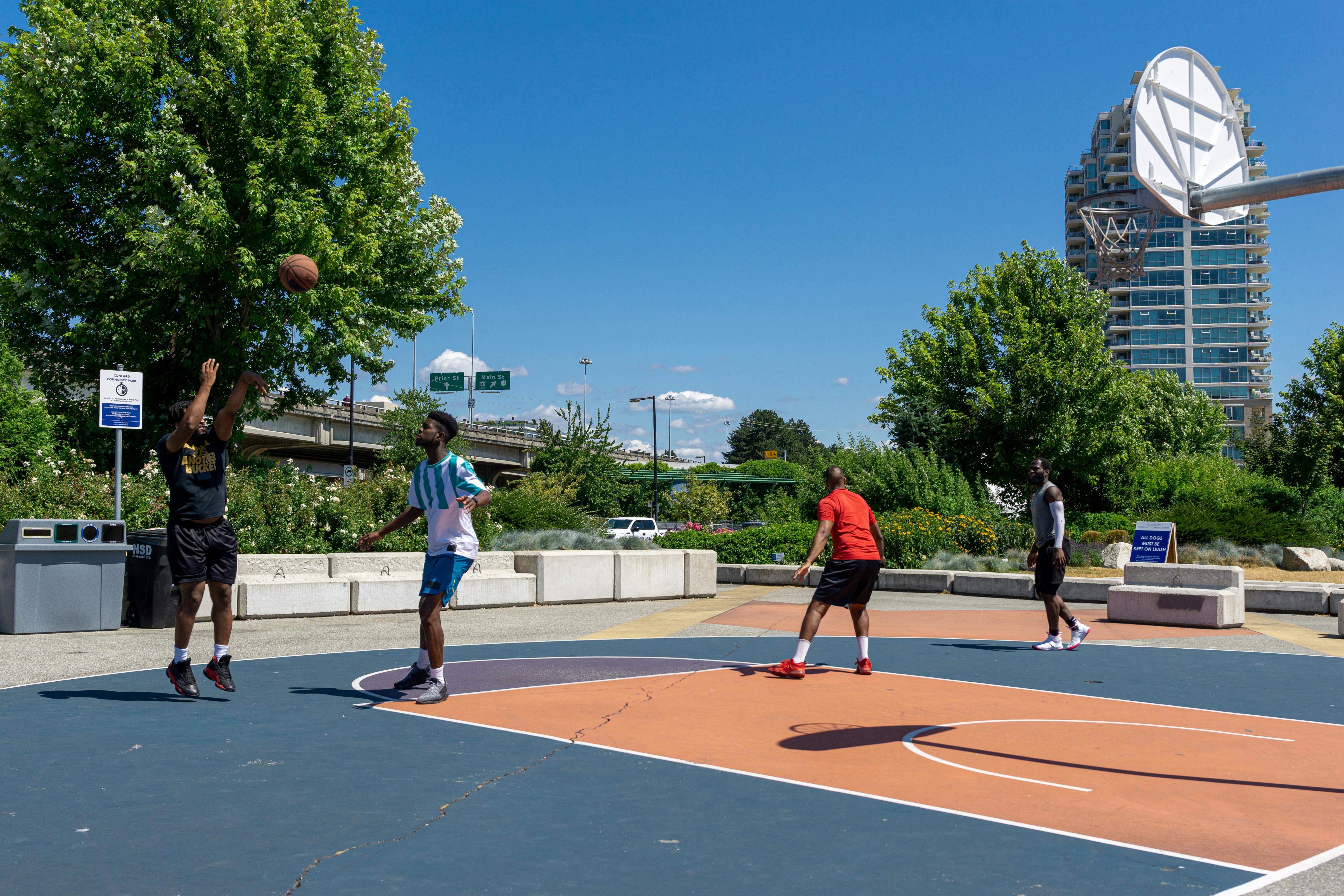 men playing basketball