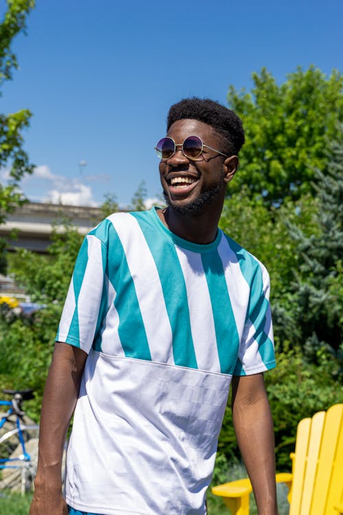 A Laughing Man Wearing Sunglasses