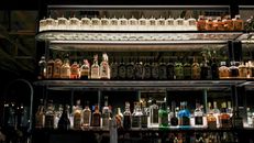 Bar Shelves Filled with Bottles