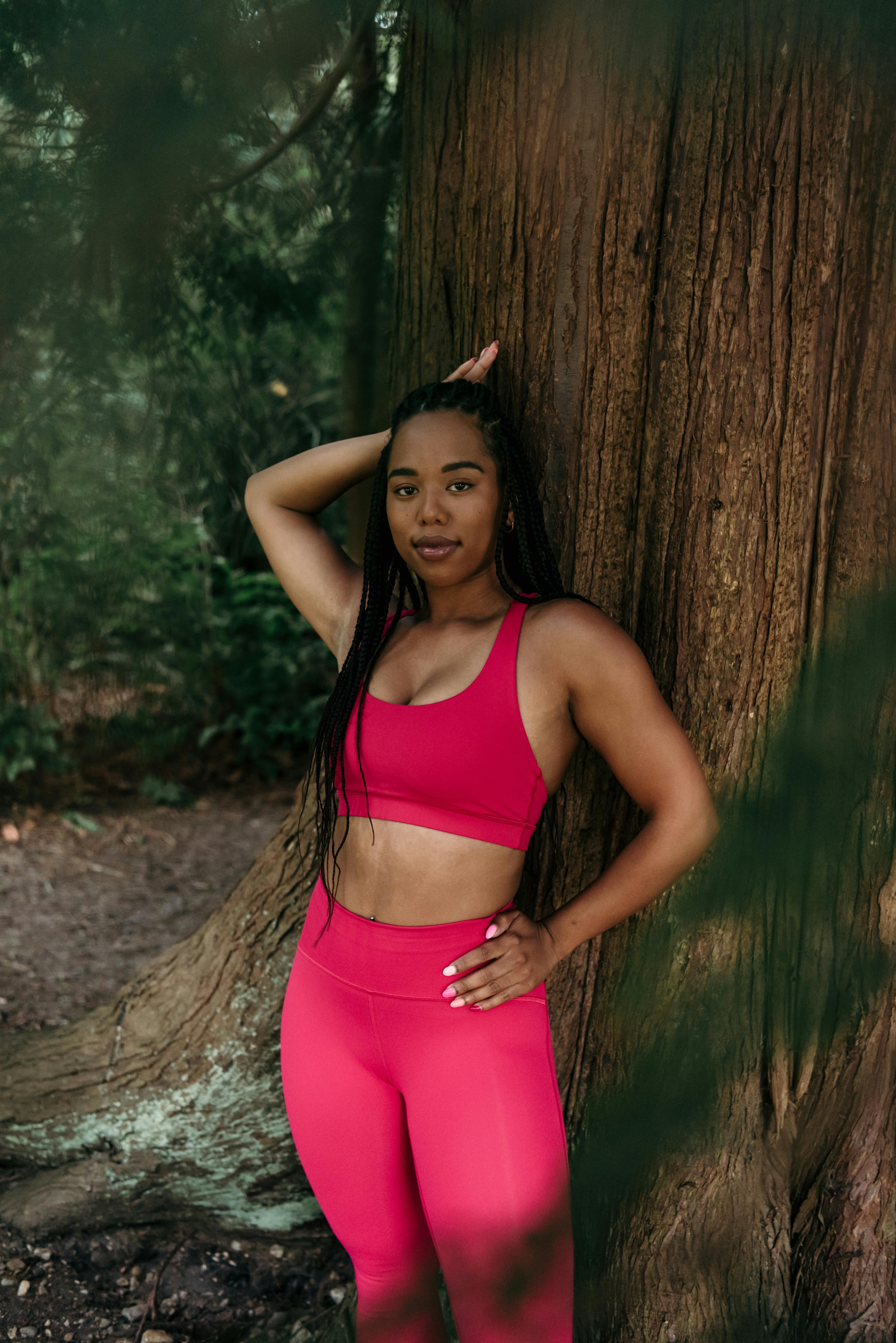 A Woman Wearing a Pink Activewear · Free Stock Photo