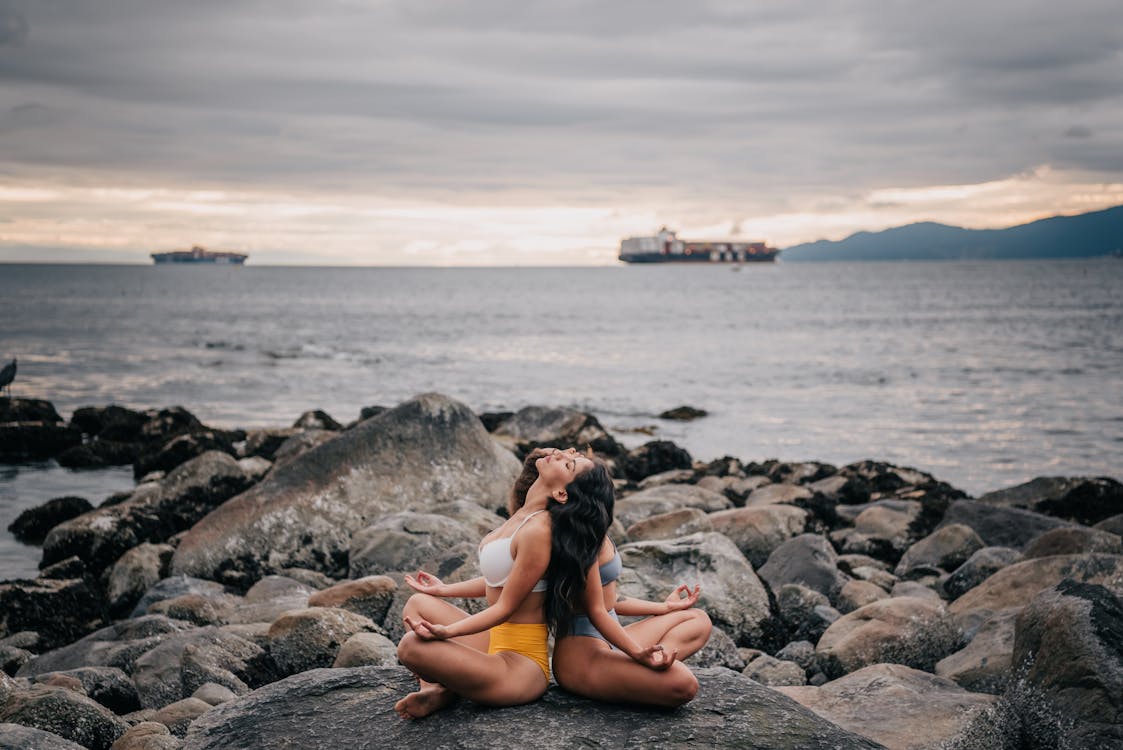 two women meditating 