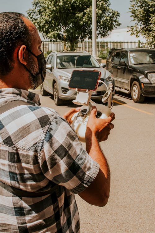 Man Operating a Dorne Controller