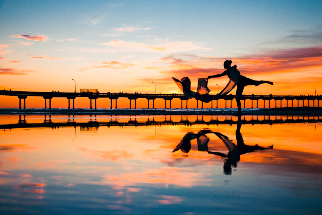 Free Silhouette and Mirror Photo of Girl Stock Photo