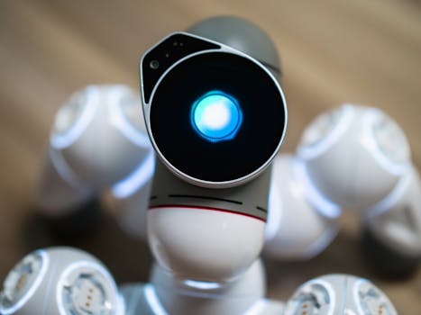Detailed close-up shot of a futuristic toy robot with a glowing head, focused on innovation.