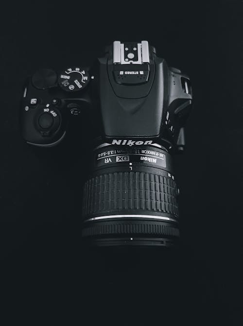 Black Nikon Dslr Camera on Black Background